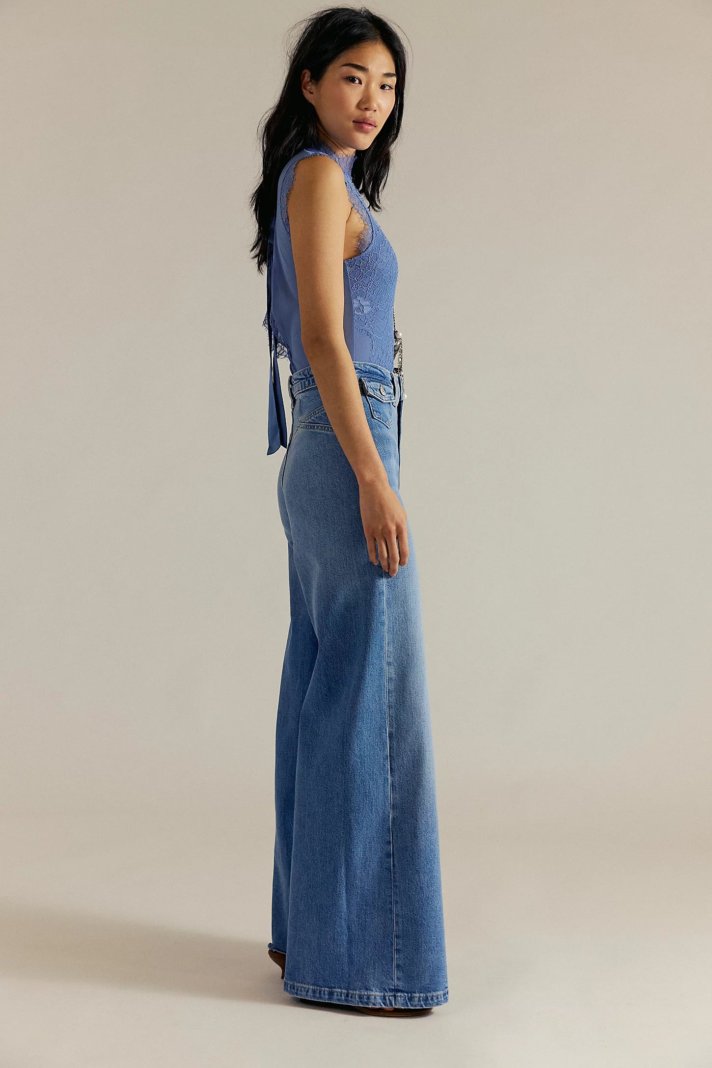 We The Free Kellee high-rise palazzo jeans in light-wash denim, featuring a fitted waist, wide-leg silhouette, Plaza Blue