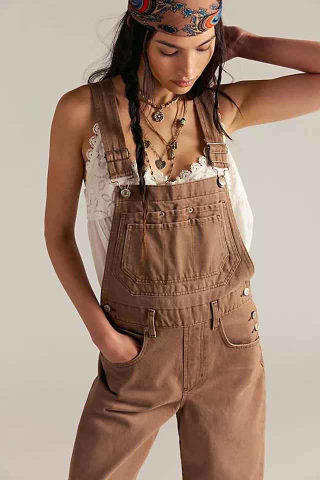 Free People Deep Trance Overalls in relaxed fit with wide-leg silhouette, boho-inspired design, and adjustable straps, Brown Sugar