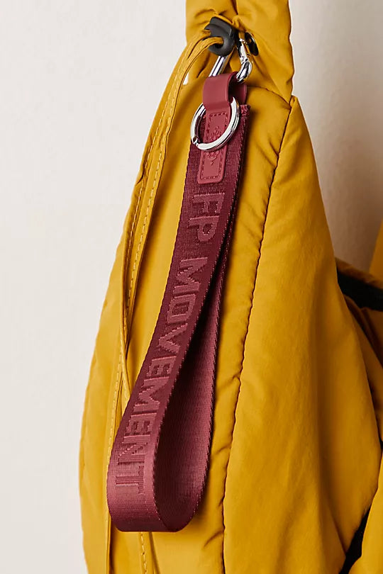 Free People There It Is Keychain – A sporty and versatile keychain with the FP Movement logo at the center, Mahogany