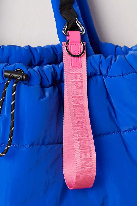 Free People There It Is Keychain – A sporty and versatile keychain with the FP Movement logo at the center, Bubble Gum