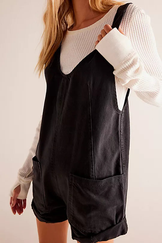 We the Free Highroller Shortall in denim with a relaxed fit and adjustable straps, offering a cool, easygoing style, True North