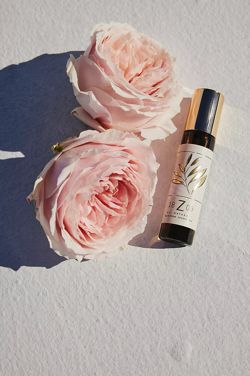 Free People 1809 Collection All-Natural Fragrance – A luxurious, all-natural fragrance with a blend of essential oils, offering a refreshing and soothing scent in a sleek glass bottle, Zen