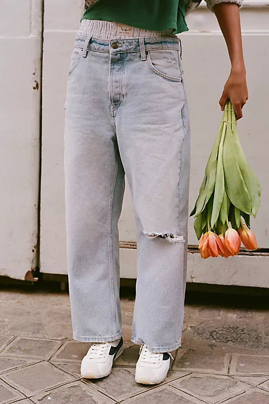 We The Free Deep Trance Dropped Boyfriend Jeans – Relaxed, slouchy jeans with a dropped waist, distressed detailing, and cuffed hems, offering a laid-back, casual look, Bleached Out